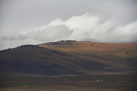 Clouds over the steppe open spaces, storm clouds over the hills. The Ukok Pla Stock Photos