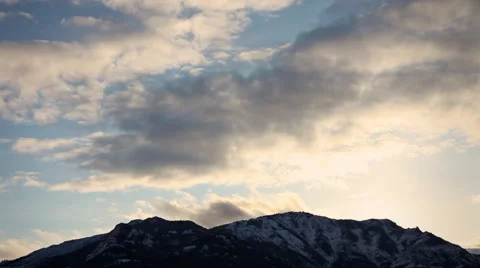 Clouds Over Sun and Mountains Timelapse Yellowstone Stock Footage 42402819