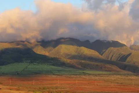 Clouds Over Sunwashed Hills Stock Photos