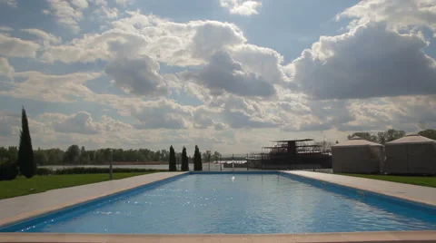 Clouds over the swimming pool timelapse Stock Footage 65201957