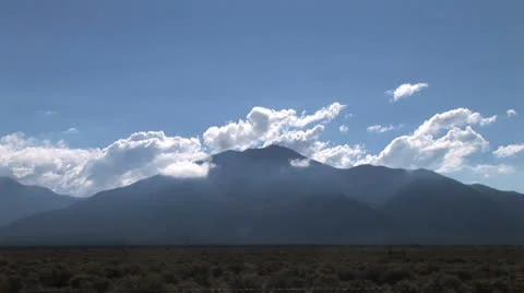 Clouds Over Taos Mountain Stock Footage