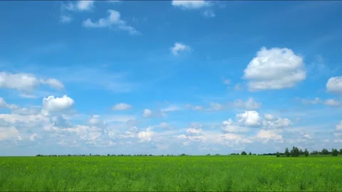 Clouds over the time-lapse field. cloud movement Stock Footage 156314721
