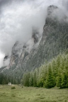 Clouds over the top of the mountains Stock Photos