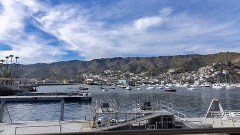Clouds Over Town &amp; Boat Dock 스톡 동영상 100299159