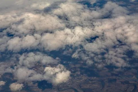 Clouds over the town Stock Photos