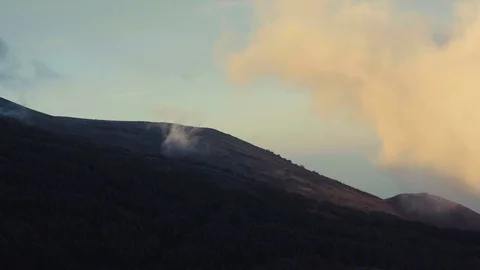 Clouds over trees on Mount Etna in Sicily, Italy Stock Footage 88565430