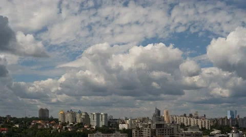 Clouds Over Urbanscape Time Lapse At 4K Stock Footage 49737206