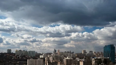 Clouds Over Urbanscape Time Lapse At 4K Stock Footage 49737279