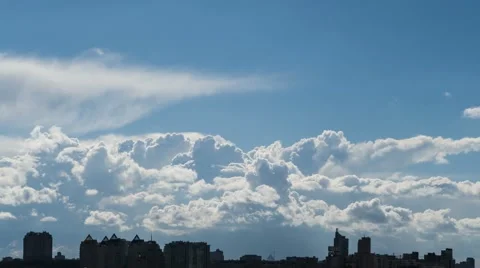 Clouds Over Urbanscape Time Lapse At 4K Stock Footage 49739982