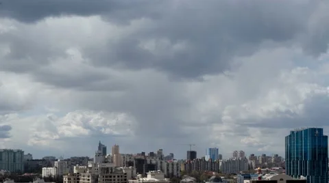 Clouds Over Urbanscape Time Lapse At 4K Stock Footage 49742251