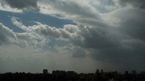 Clouds Over Urbanscape Time Lapse At 4K Stock Footage 49743070
