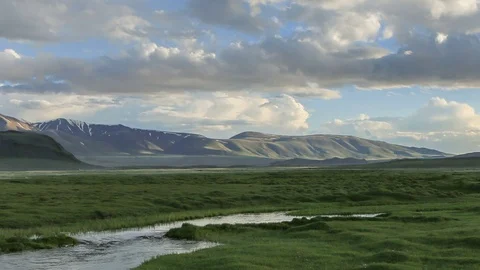 Clouds over the valley of the Tolbo, Mongolia. Full HD Stock Footage 71554959