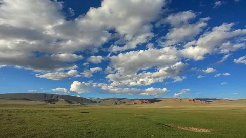 Clouds over the valley of the Tolbo, Mongolia. Full HD Stock Footage 71665475