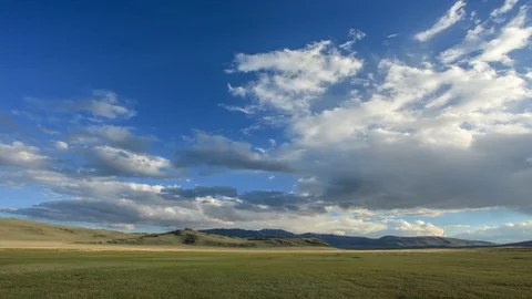 Clouds over the valley of the Tolbo, Mongolia. Full HD Stock Footage 71665489