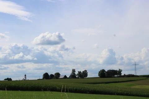 Clouds over a village Stock Photos