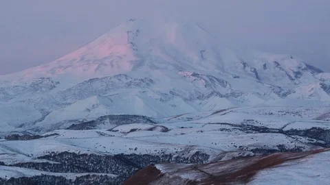 Clouds over volcano Mount Elbrus in the autumn at sunset Stock Footage 70188295