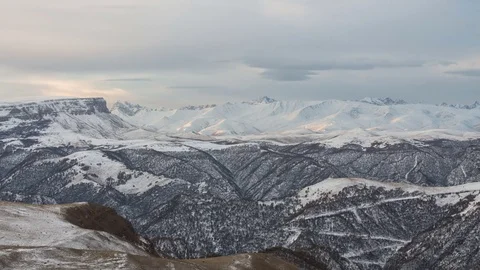 Clouds over volcano Mount Elbrus in the autumn at sunset Stock Footage 70189842