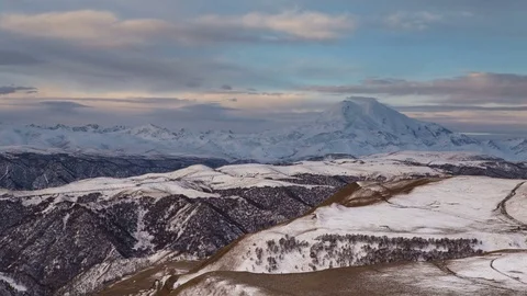 Clouds over volcano Mount Elbrus in the autumn at sunset Stock Footage 70491009