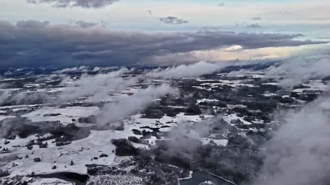 Clouds over Winter snow covered landscape aerial Video stock 337588760