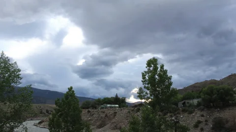 Clouds over Yellowstone River in Gardiner, MT, 4K. Stock Footage 312688093