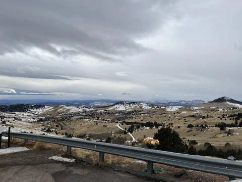 Clouds overlooking small town Stock Photos
