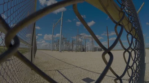 Clouds pass behing a power station in time-lapse. Stock Footage 92072595