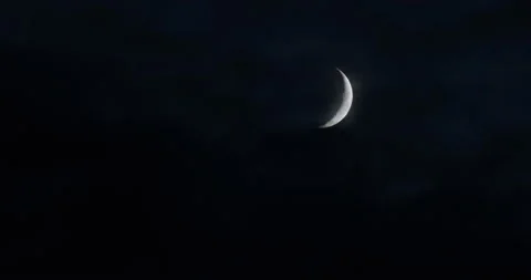 Clouds pass by the moon, winds blow during the storm.Details on the surface Stock Footage 121362912