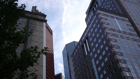 Clouds pass over buildings in downtown Pittsburgh Stock Footage 81435613
