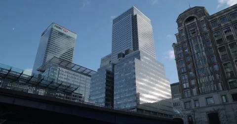 Clouds pass over Canary Wharf London | 4K Timelapse Stock Footage 46304993