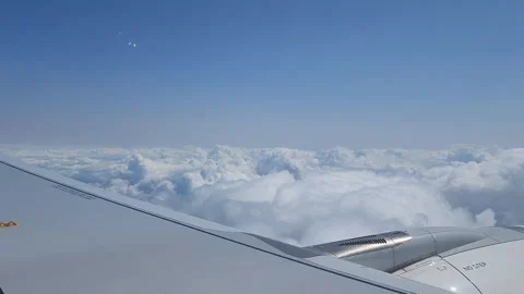 Clouds from the Passenger seat Stock Footage 261351803