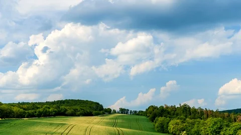Clouds passing above rural fields in South Moravia, Czech Republic. Stock Footage 90335225