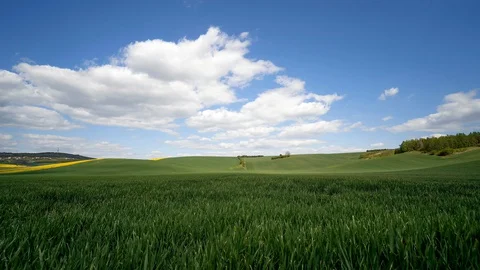 Clouds passing above rural fields in South Moravia, Czech Republic. Stock Footage 129488592