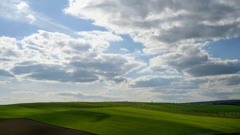 Clouds passing above rural fields in South Moravia, Czech Republic. Stock Footage 129489690