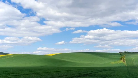 Clouds passing above rural fields in South Moravia, Czech Republic. Stock Footage 129490114
