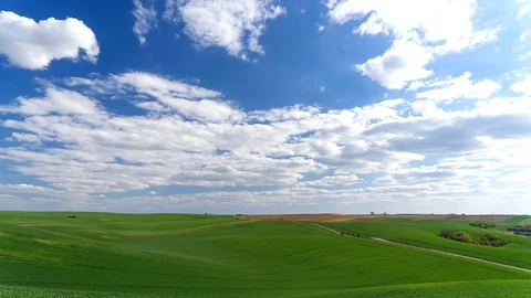 Clouds passing above rural fields in South Moravia, Czech Republic. Stock Footage 129663692