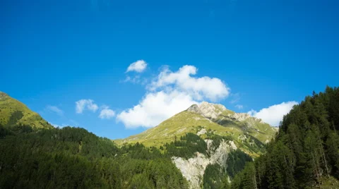 Clouds passing alpine mountain Stock Footage 65051005