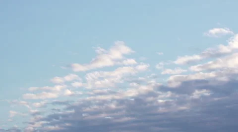 Clouds passing by and covering a blue sky Stock Footage 53237102