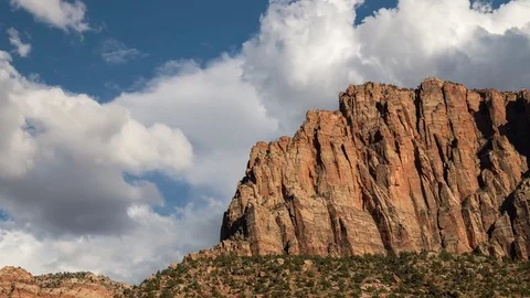 Clouds passing behind a mountain Video stock 82470586