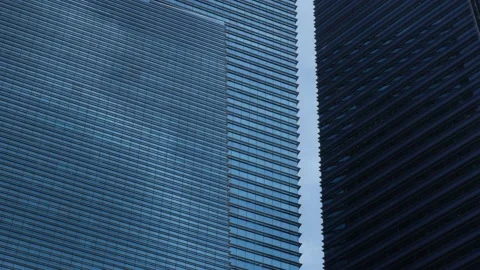 Clouds Passing Between Two Corporate Buildings, Full Frame Stock Footage 145239908