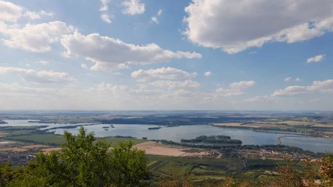 Clouds passing blue lakes landscape time lapse in Moravia Stock Footage 88297827