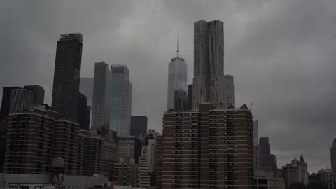 Clouds Passing Freedom Tower Behind City Skyline - New York Stock Footage 138905048
