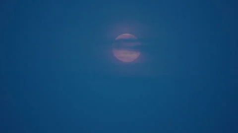 Clouds passing in front of a full moon Stock Footage 276411139