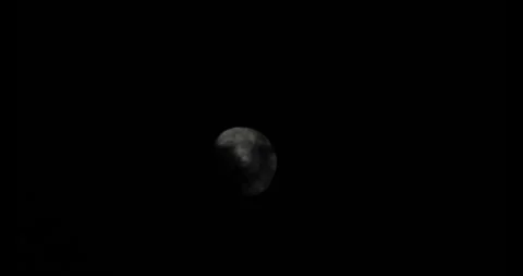Clouds Passing in front of Waxing Gibbous Moon Stock Footage 292726151
