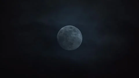 Clouds passing infront of large full moon 스톡 동영상 332604473