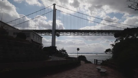Clouds Passing By the Kanmon Bridge and Straits Vídeos de archivo 97368395