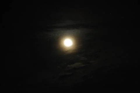 Clouds passing by moon at night. Full moon at night with cloud real time Stock Photos