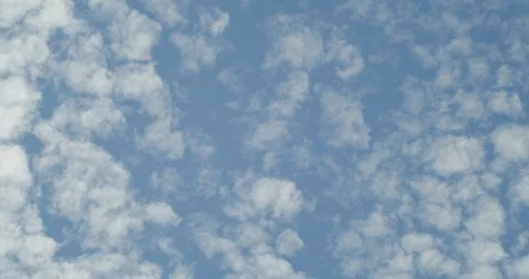 Clouds Passing Over Blue Sky Time Lapse Stock Footage 128469016