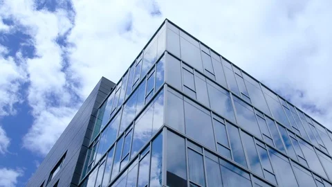Clouds Passing over a building and reflecting off the windows Video stock 110913044