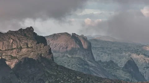 Clouds passing over ergaki mountain range Stock Footage 300902023
