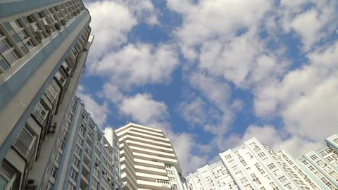 Clouds passing over a highrise Stock Footage 72860149